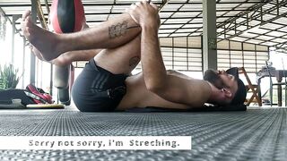 Stretching before Muay Thai training - at Thailand, Pai district, Mae Hong Son.