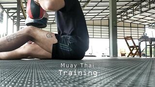 Stretching before Muay Thai training - at Thailand, Pai district, Mae Hong Son.