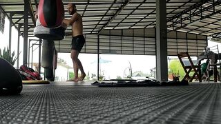 Stretching before Muay Thai training - at Thailand, Pai district, Mae Hong Son.