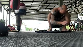 Stretching before Muay Thai training - at Thailand, Pai district, Mae Hong Son.