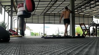 Stretching before Muay Thai training - at Thailand, Pai district, Mae Hong Son.