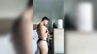 HOT HUNK IN BLACK BIKINIS