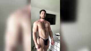 HOT HUNK IN BLACK BIKINIS