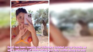 Demi Rose sizzles in see-through orange bikini as she shows off famous curves