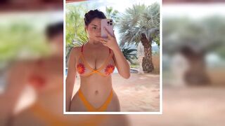 Demi Rose sizzles in see-through orange bikini as she shows off famous curves