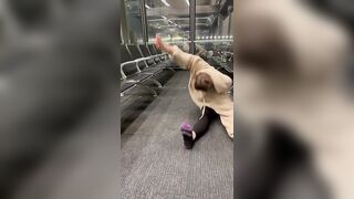 Stretching in O’hare airport #workout #stretch #youtubeshorts #rachelpizzolato #airport