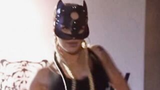 Arsenal star's twerk queen Wag wears black leather cat mask for raunchy demo