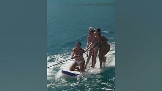 Can the ladies do it on the pasdleboard? #travel #bikini #gosailing