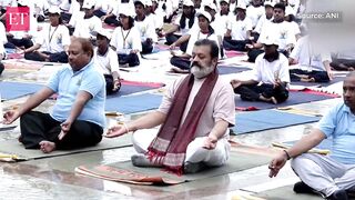 Suresh Gopi performs yoga asanas on International Yoga Day in Thiruvananthapuram