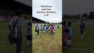 Stretching exercises at International Youth Football Tournament. #marbellaacademy #football #shorts