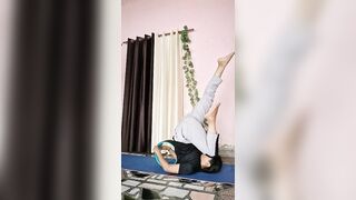 Sarvangasana practice with yoga wheel || #yogasans #yogaposes #yogabalance #yogawheel