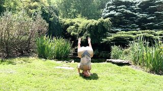 Sexy Yoga Dance Flow Woman in Bikini Lingerie by a Waterfall Pond in Nature