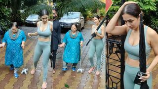 Bollywood Diva Malaika Arora Trying To Help Old Women At Diva Yoga Bandra