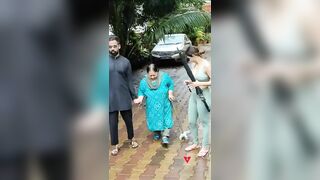 Bollywood Diva Malaika Arora Trying To Help Old Women At Diva Yoga Bandra