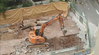 Road Construction: Excavator stretching arm to shovel #roadworks #excavator