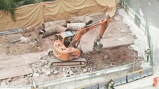 Road Construction: Excavator stretching arm to shovel #roadworks #excavator