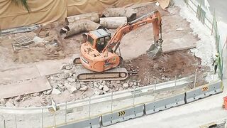 Road Construction: Excavator stretching arm to shovel #roadworks #excavator