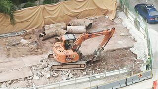 Road Construction: Excavator stretching arm to shovel #roadworks #excavator