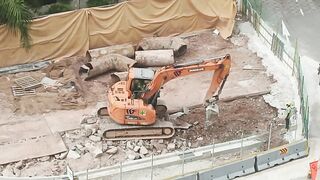 Road Construction: Excavator stretching arm to shovel #roadworks #excavator