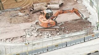 Road Construction: Excavator stretching arm to shovel #roadworks #excavator