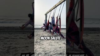 SALUTING THE MOON ON THE SLING YOGA #yoga #yogapractice #viral #shortsvideo #tricks #best #beach